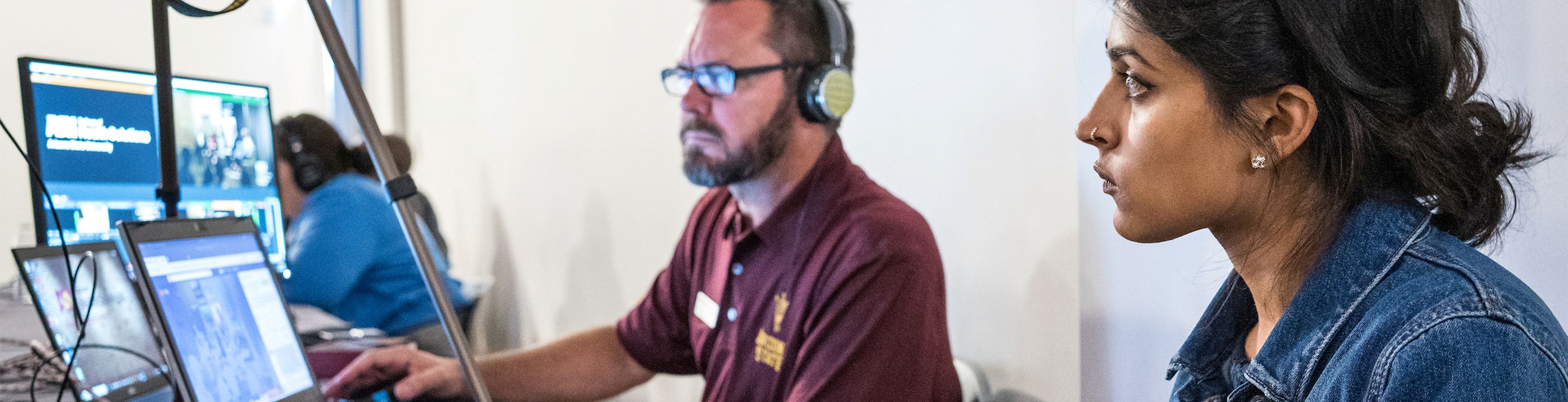 Man working on computer.